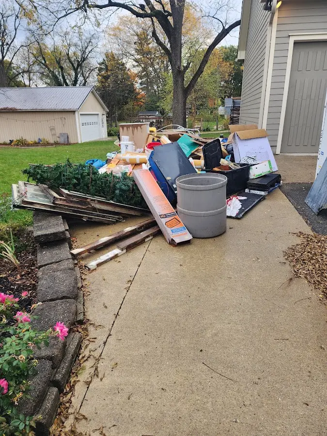Dumpster being loaded with debris for 3 Yard Dumpster Rental in Warm Mineral Springs